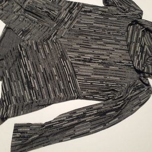 Size 12 warm black and silver top
